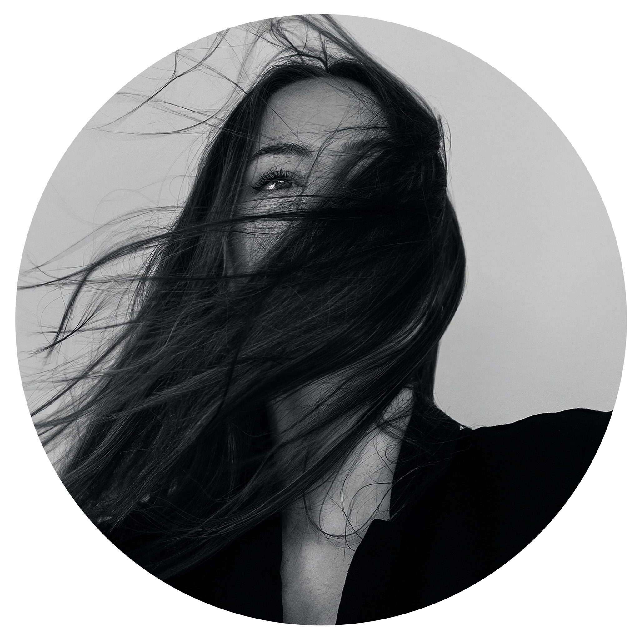 black and white picture with woman with long flowing dark hair